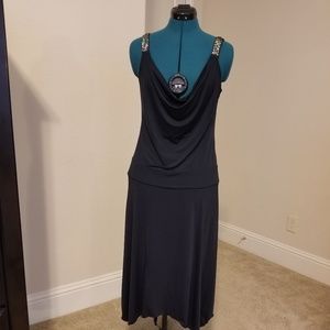 Navy drop waist dress with cowl neckline.